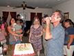 Steve preparing to cut the cake