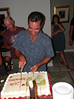 Steve cutting the cake.