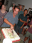 Steve cutting the cake.