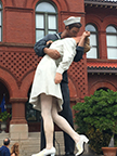 A 25-foot-high bronze sculpture, portraying the world-famous 1945 image of a sailor and nurse locked in an immortalized kiss taken in New York’s Times Square on V-J Day 1945