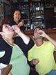 Norma, Vivian and Steve doing shots