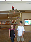 Miranda and Johnny and a cockatoo at the lobby at the Wiakola Hilton Village