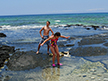 Kids playing at ocean