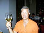 Greg enjoying a glass of wine