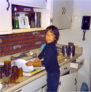 Steve helping with the dishes, and only 4 years old